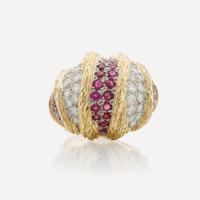 A gold, diamond, and ruby ring