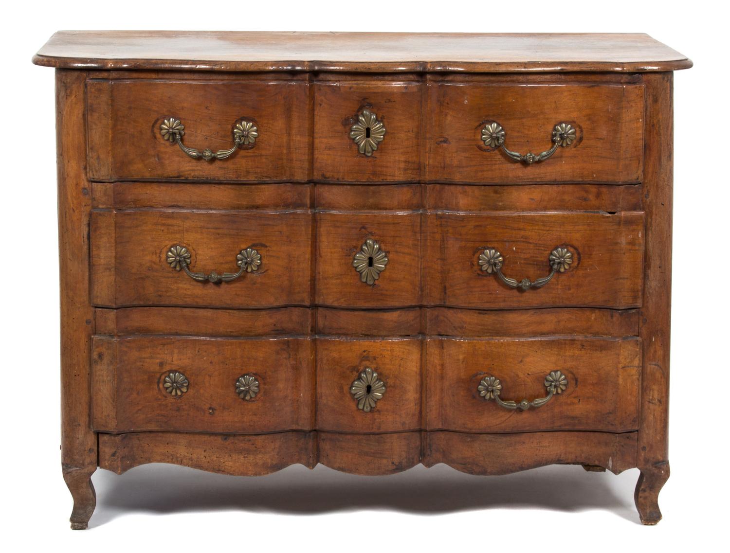 A Louis XV Provincial Style Carved Walnut Three Drawer Commode Height 36 x width 49 x depth 23 1/2 inches. — 19TH CENTURY