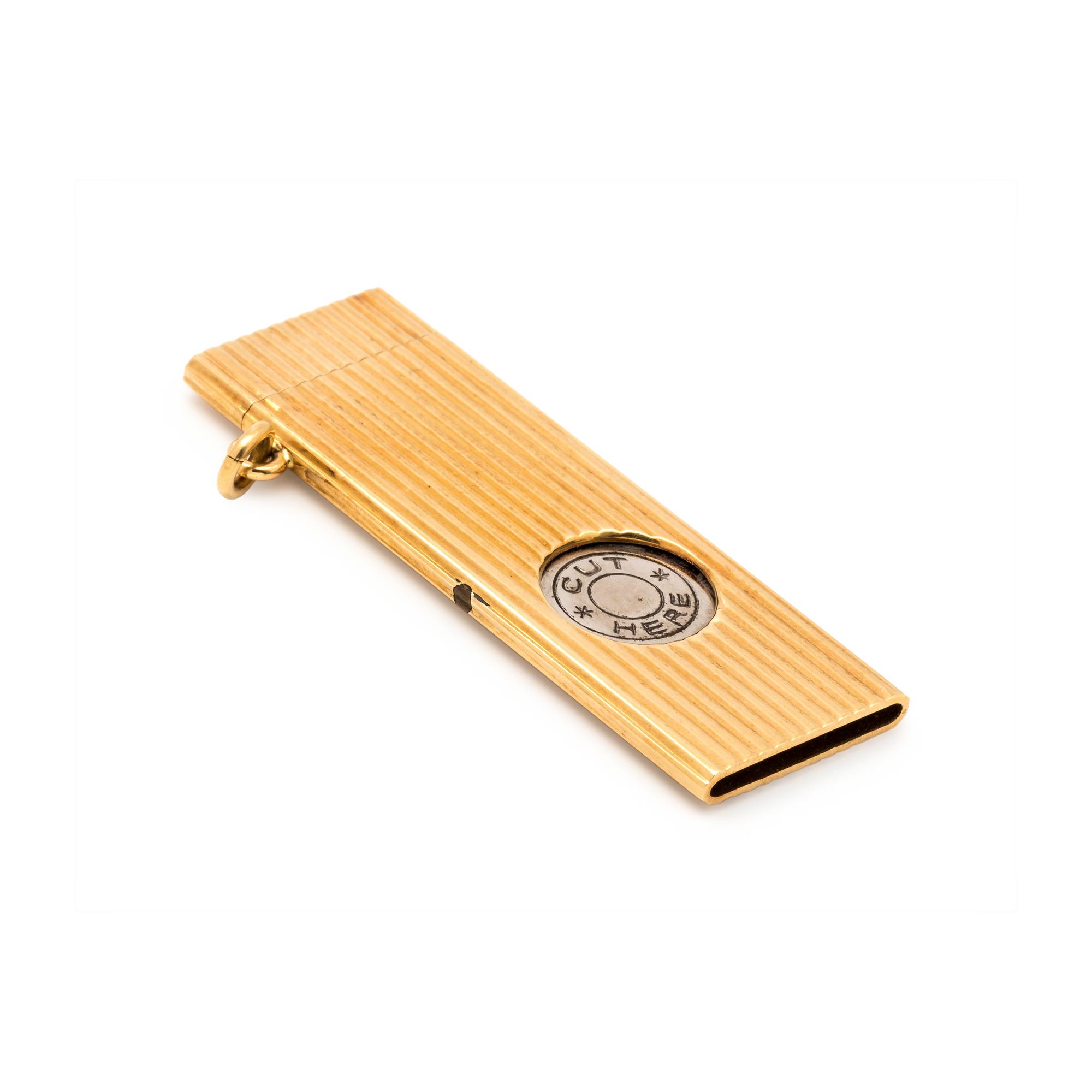 KUTCHINSKY, YELLOW GOLD AND STEEL CIGARETTE CUTTER
