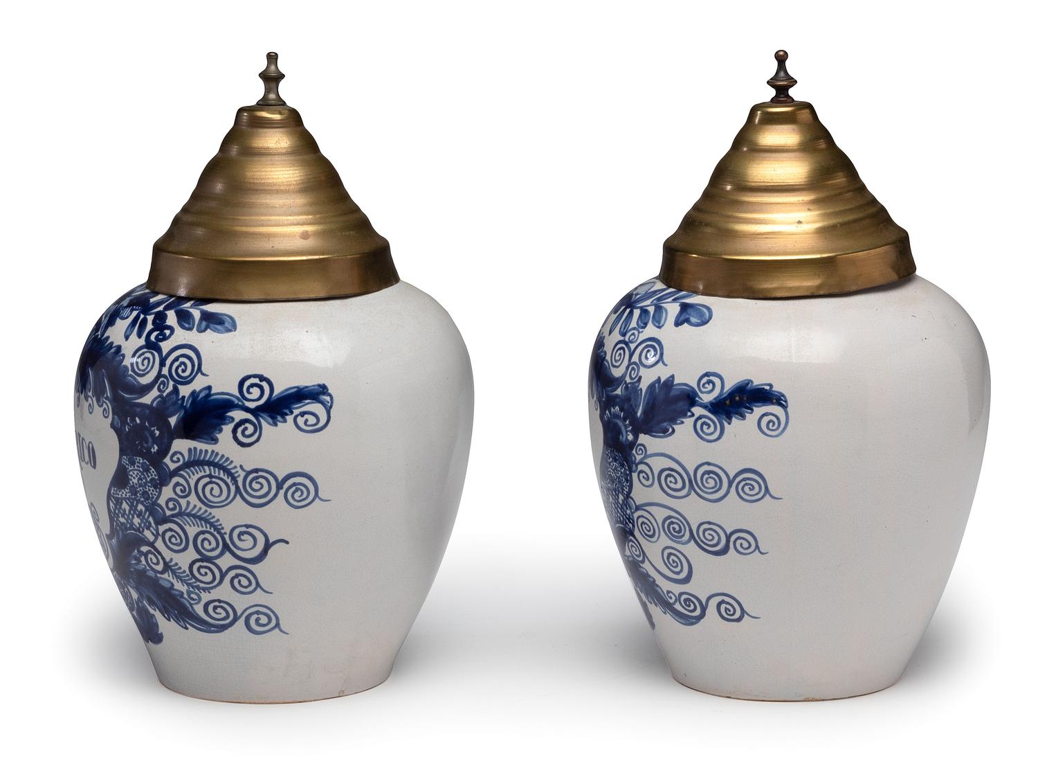 A Pair of Delft Lidded Tobacco Jars