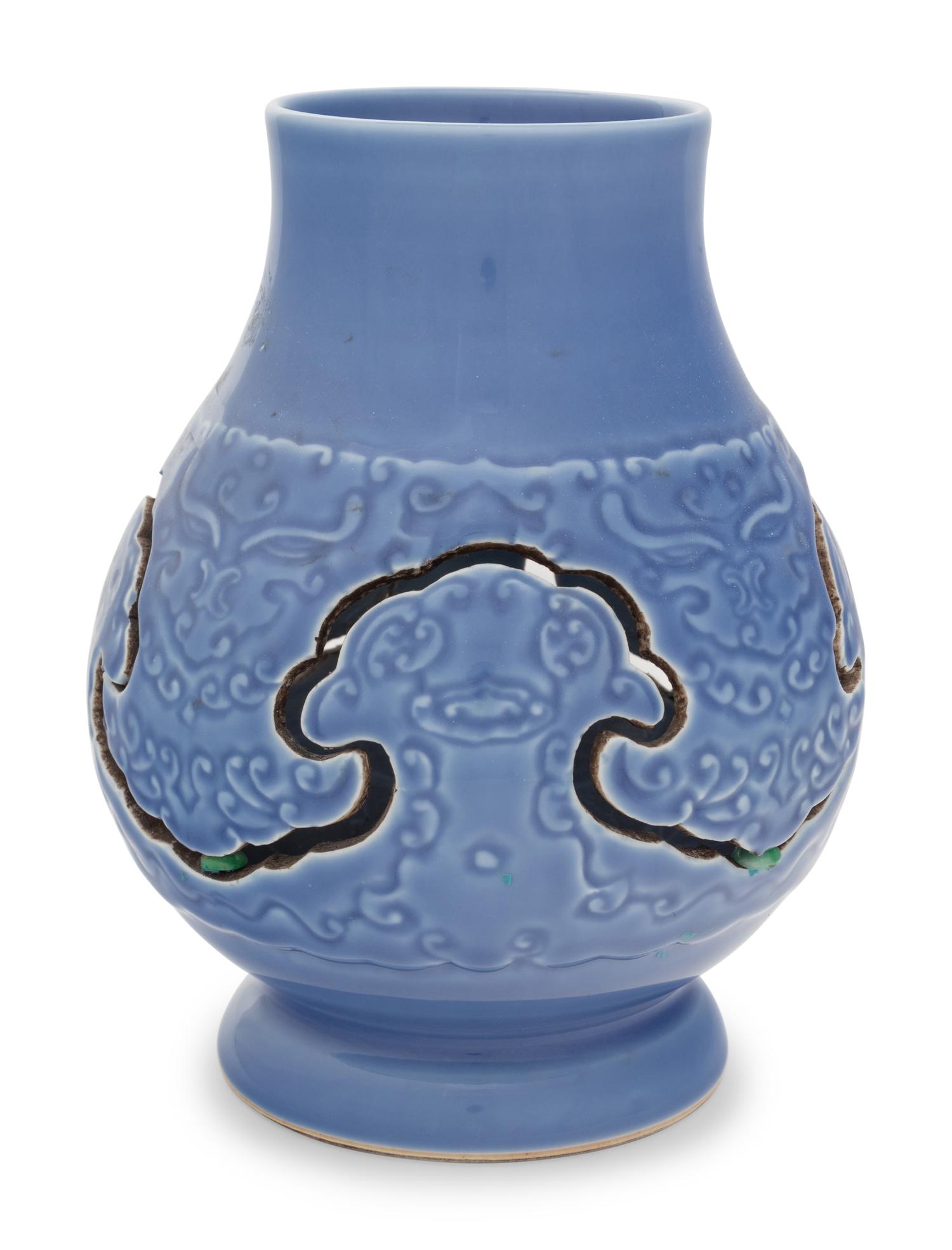 A Claire-de-Lune Glazed Carved Porcelain Reticulated Vase