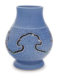 A Claire-de-Lune Glazed Carved Porcelain Reticulated Vase