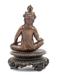 A Nepalese Bronze and Silver Figure of Seated Kubera