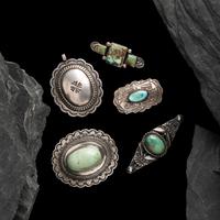 Group of Navajo Silver Pins and Pendants