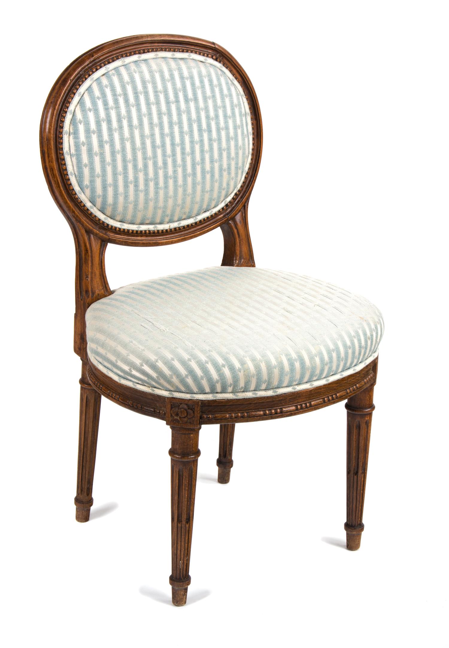 A Louis XVI Style Walnut Diminutive Side Chair Height 27 inches. — 19TH CENTURY
