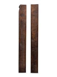 A Pair of Continental Carved Figural Pilasters