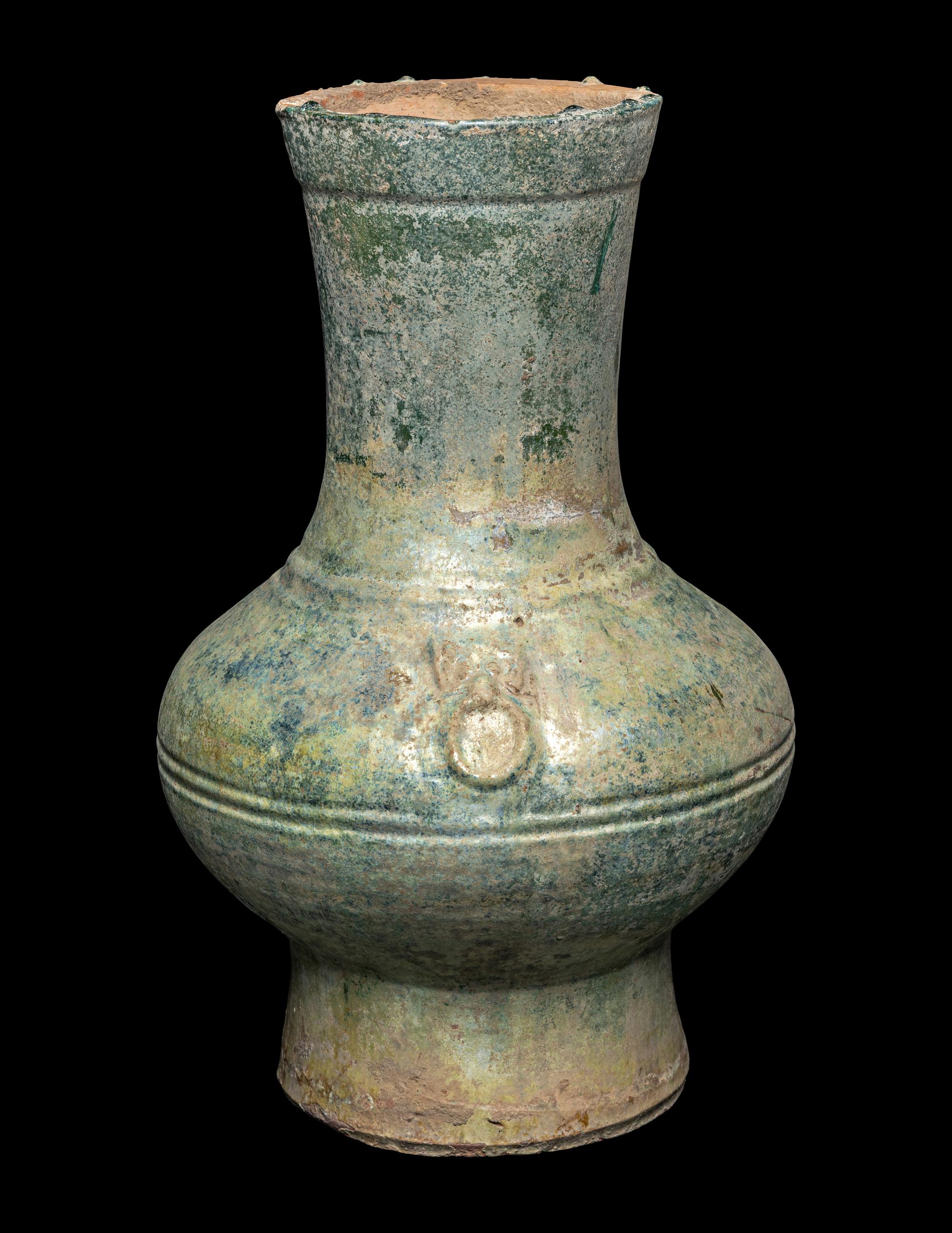 A Chinese Green Glazed Pottery Hu Vase