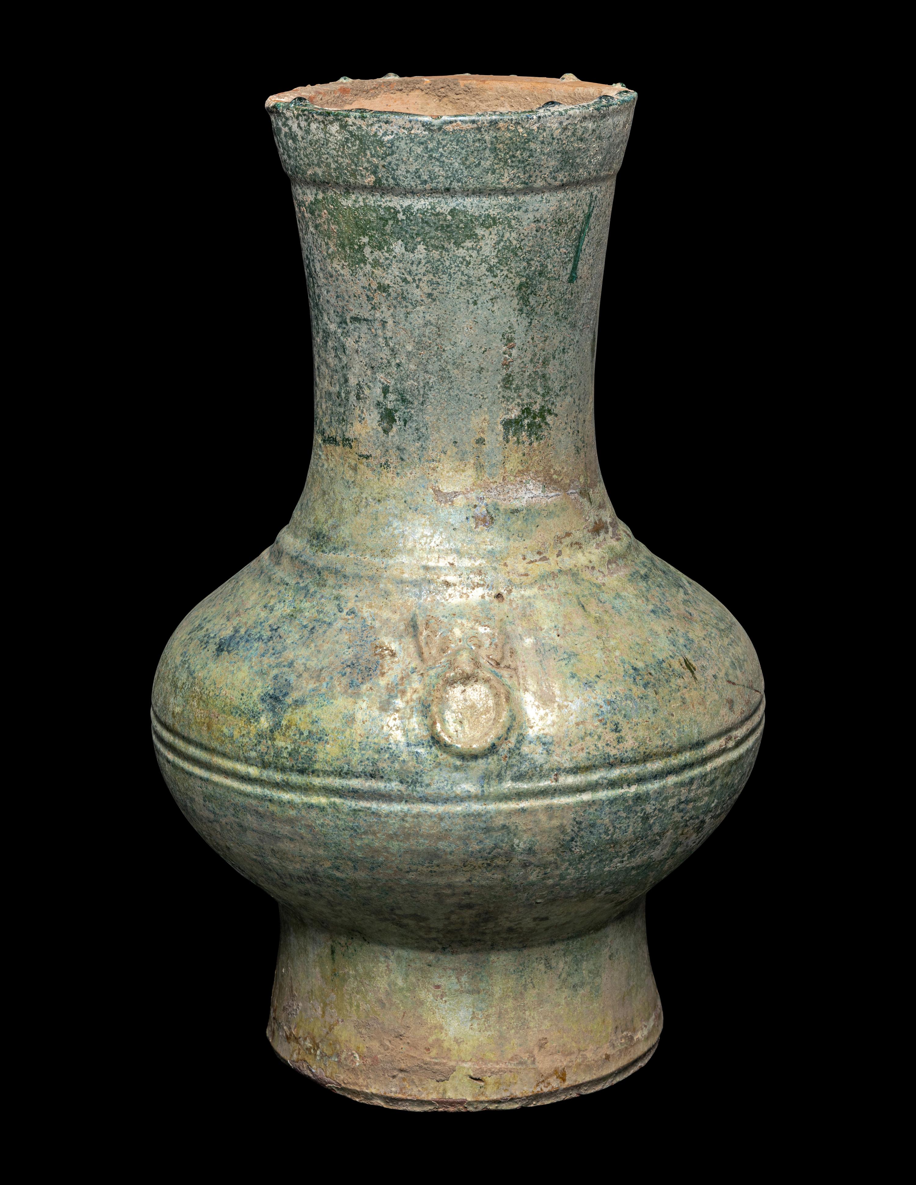 A Chinese Green Glazed Pottery Hu Vase