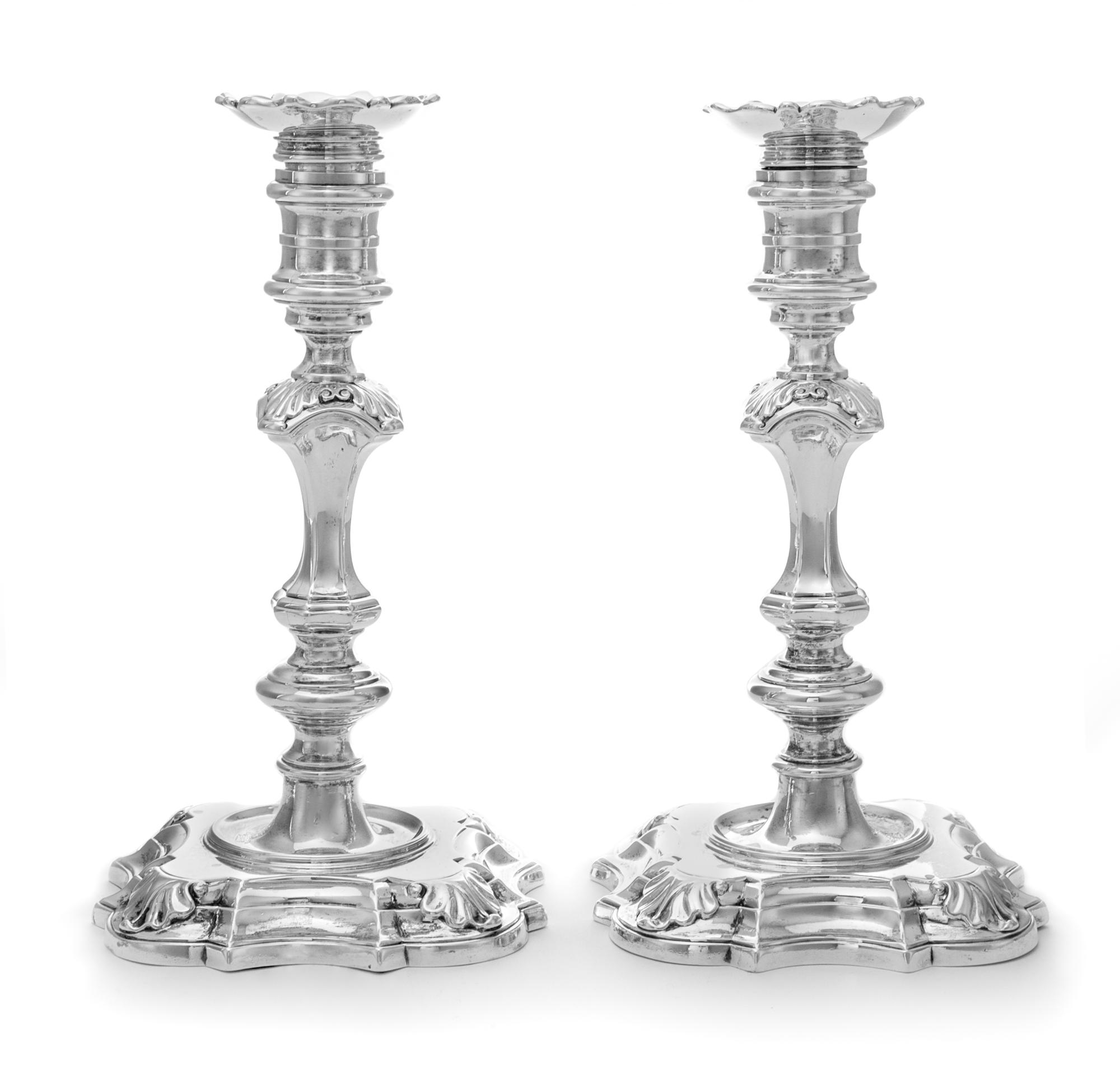 A Pair of George II Silver Candlesticks, George Wickes, London, 1743, each having a banded candle cup surmounting a knopped and banded