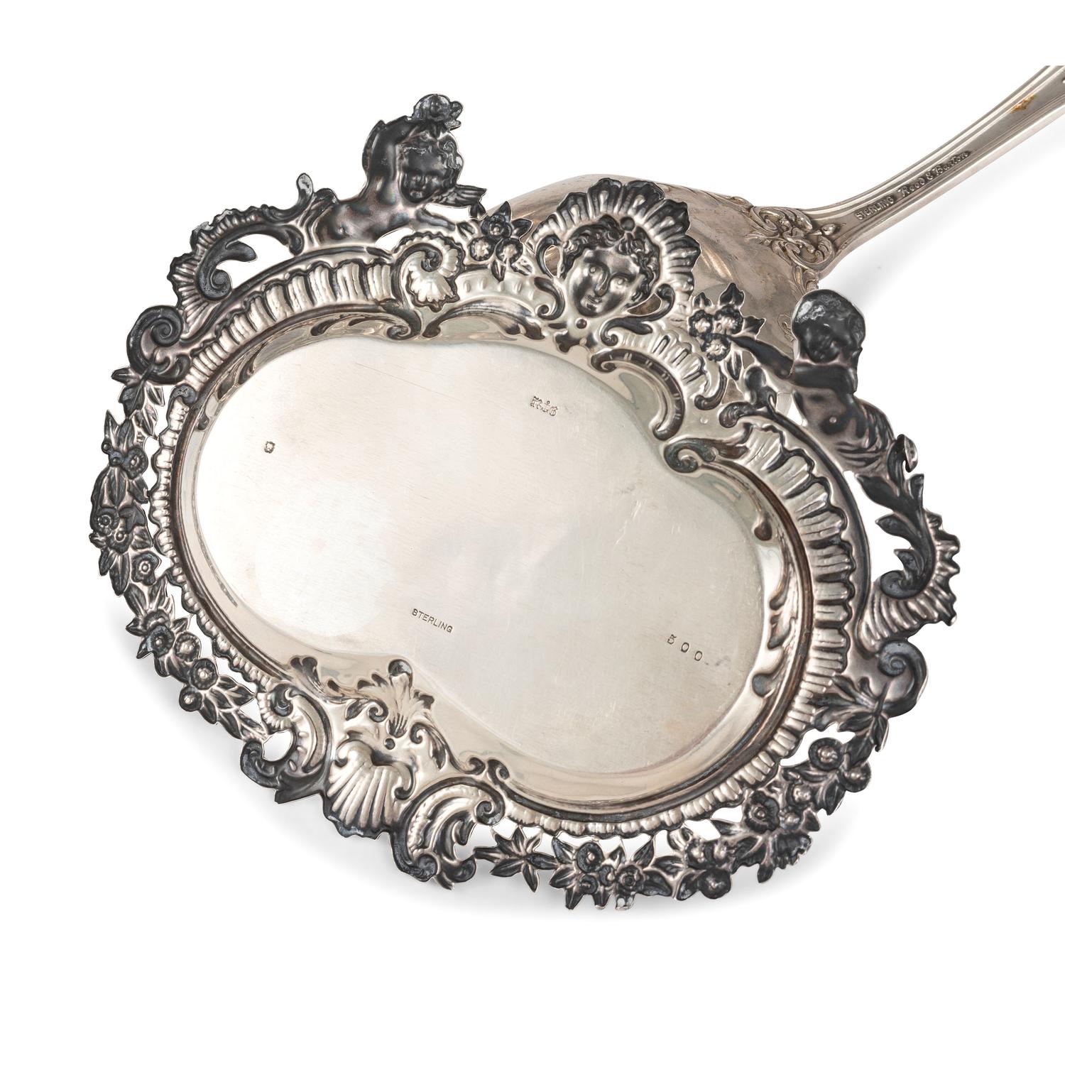 A Collection of Silver Serving Wares