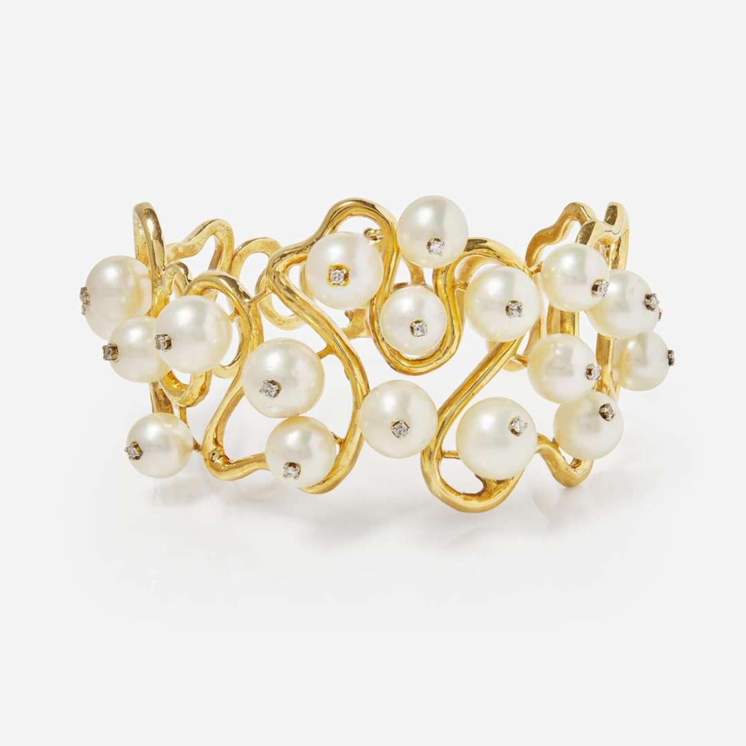 An 18K Yellow Gold, Pearl, and Diamond Bracelet