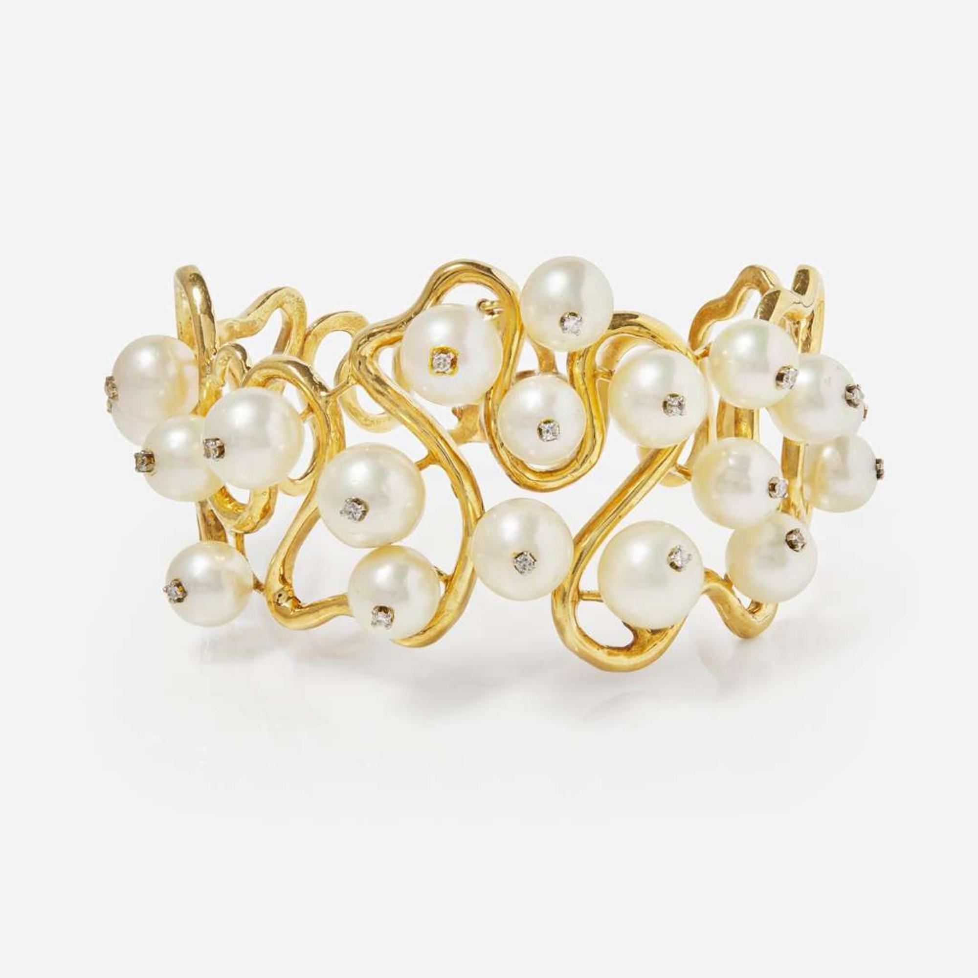 An 18K Yellow Gold, Pearl, and Diamond Bracelet