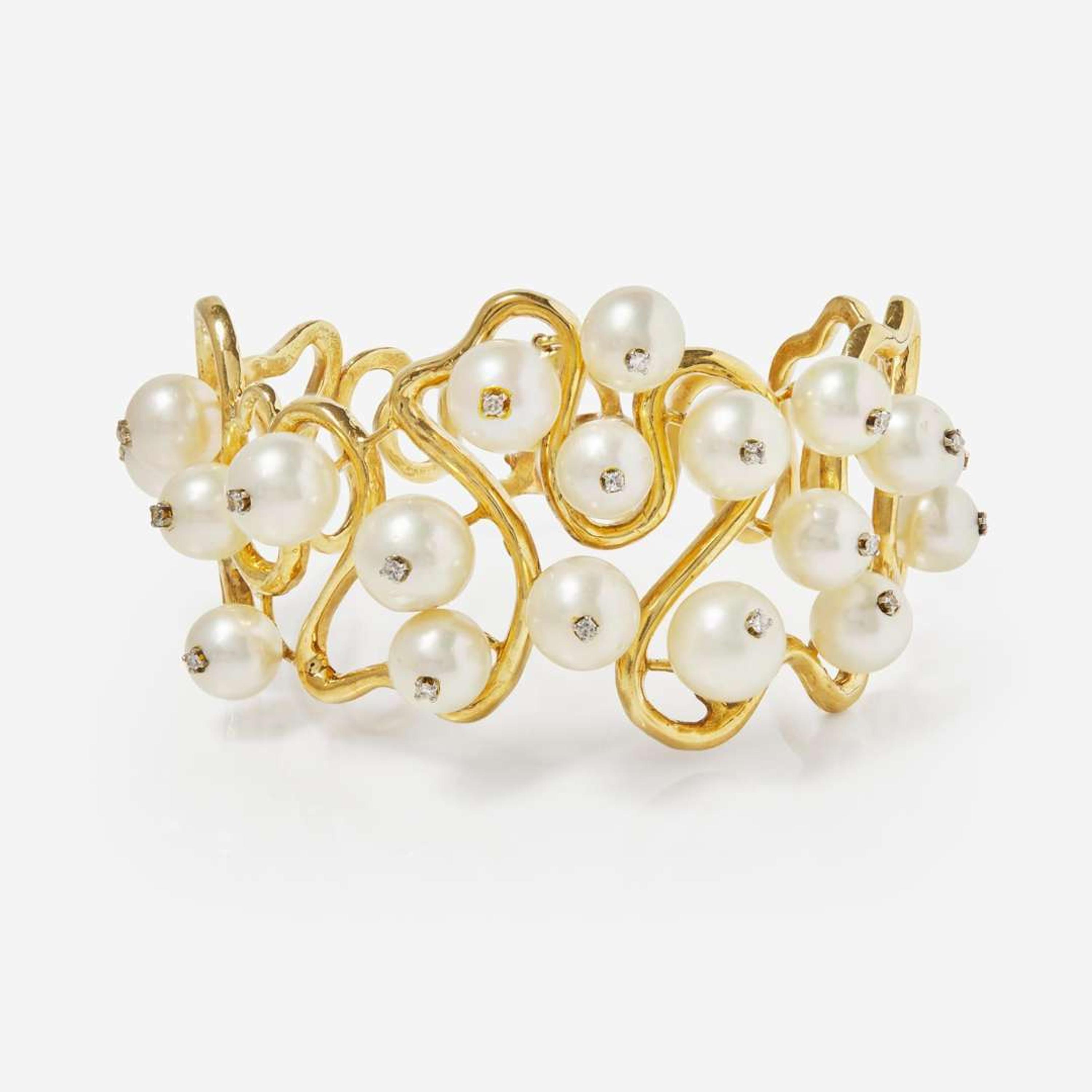 An 18K Yellow Gold, Pearl, and Diamond Bracelet