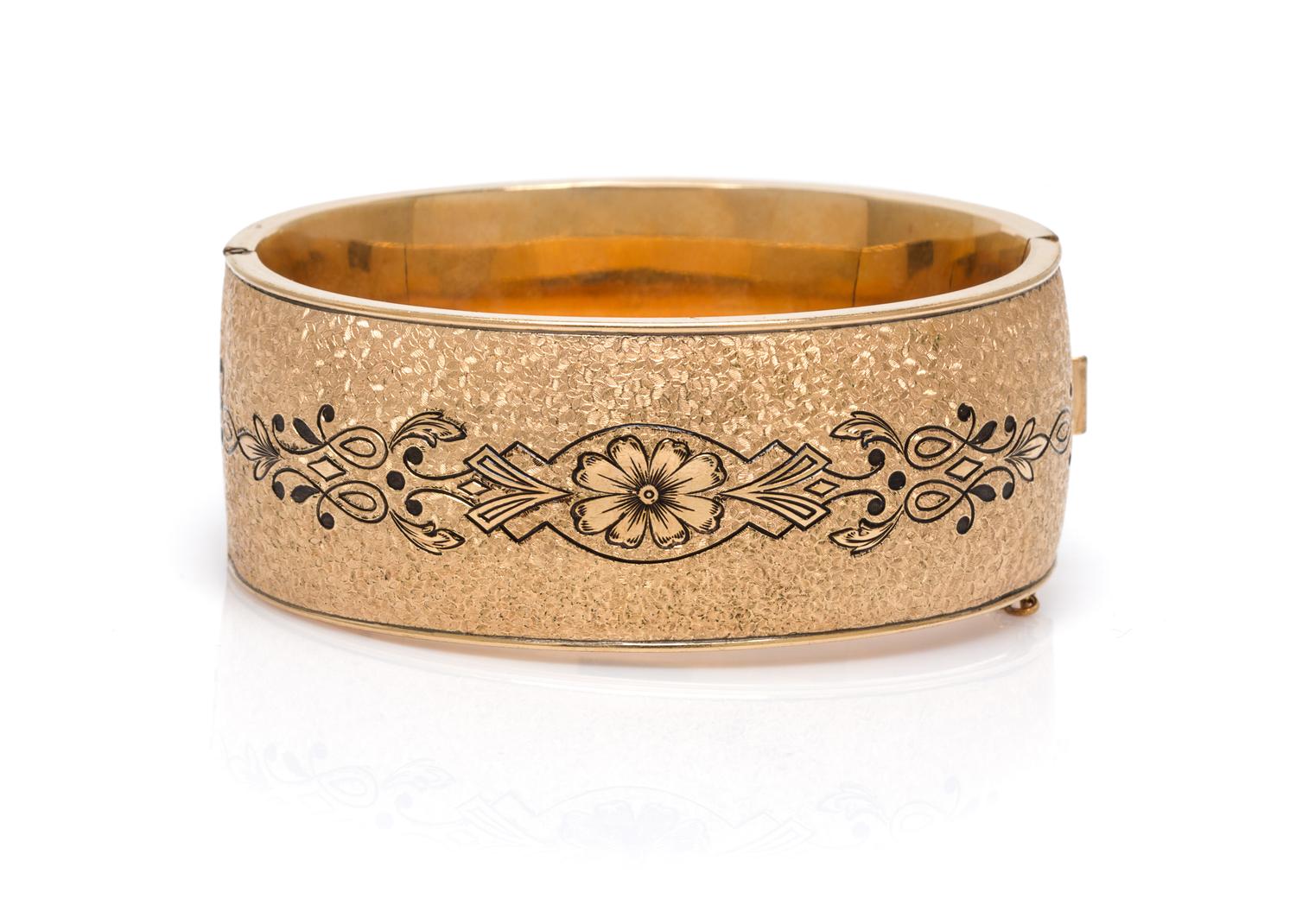 A Gold Filled and Black Enamel Bangle, 24.20 dwts.