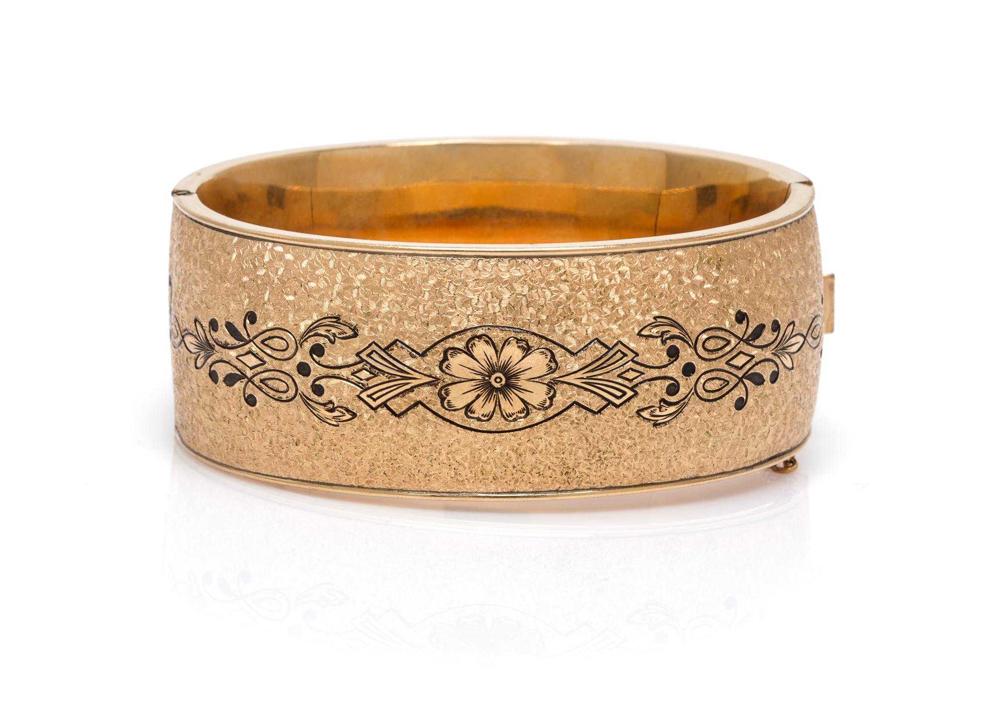 A Gold Filled and Black Enamel Bangle, 24.20 dwts.