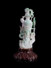 An Apple Green and White Jadeite Figure of a Lady Immortal
