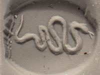 A Greek Quartz Scaraboid with a Snake
