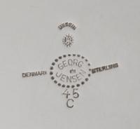 A Danish Silver Tea and Coffee Service, Georg Jensen Silversmithy, Copenhagen, Second Half 20th Century, Cosmos pattern, comprising a h