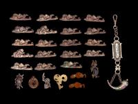 26 Mixed Metal Menuki and A Silver Flask Pendant