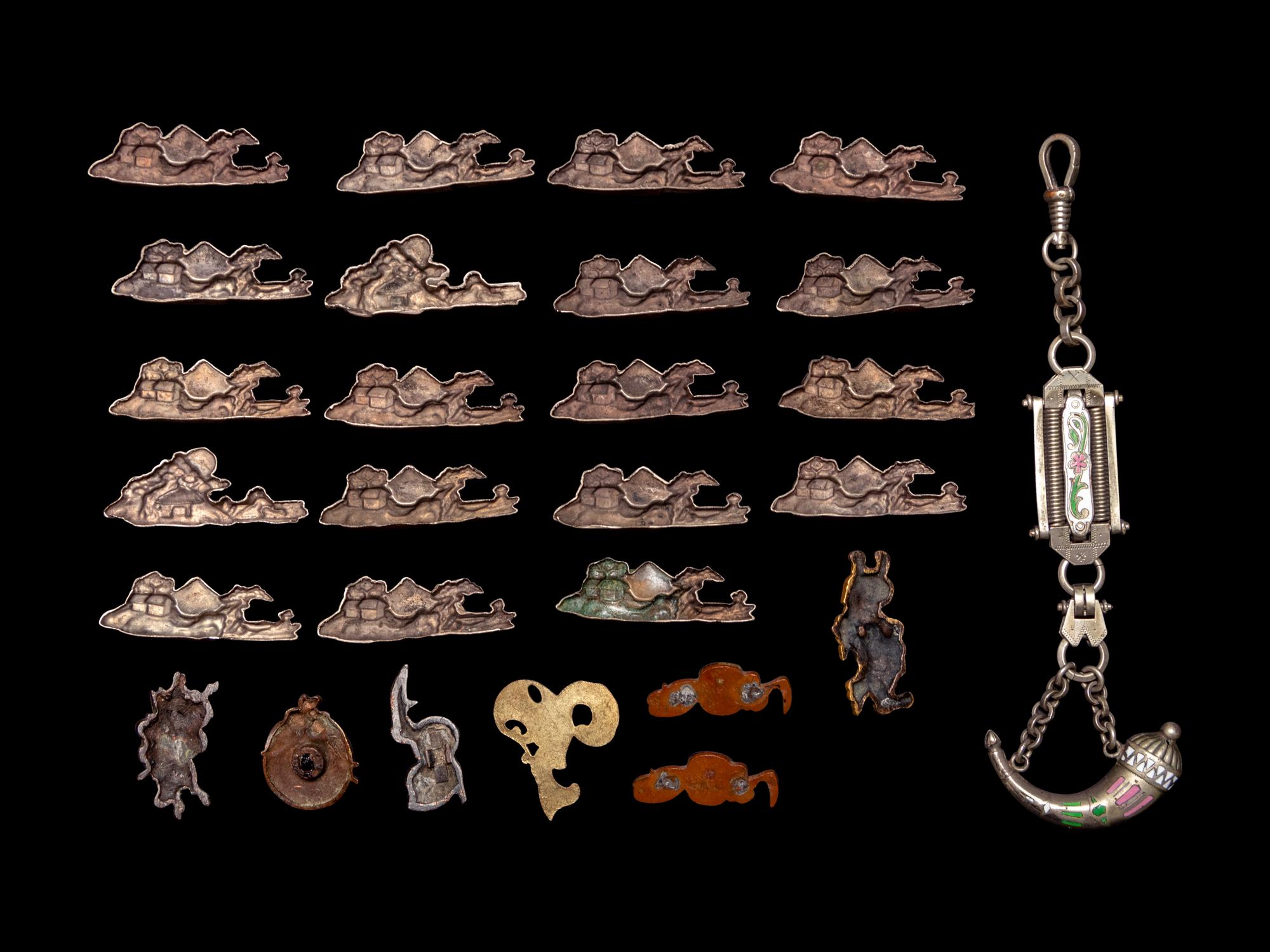 26 Mixed Metal Menuki and A Silver Flask Pendant