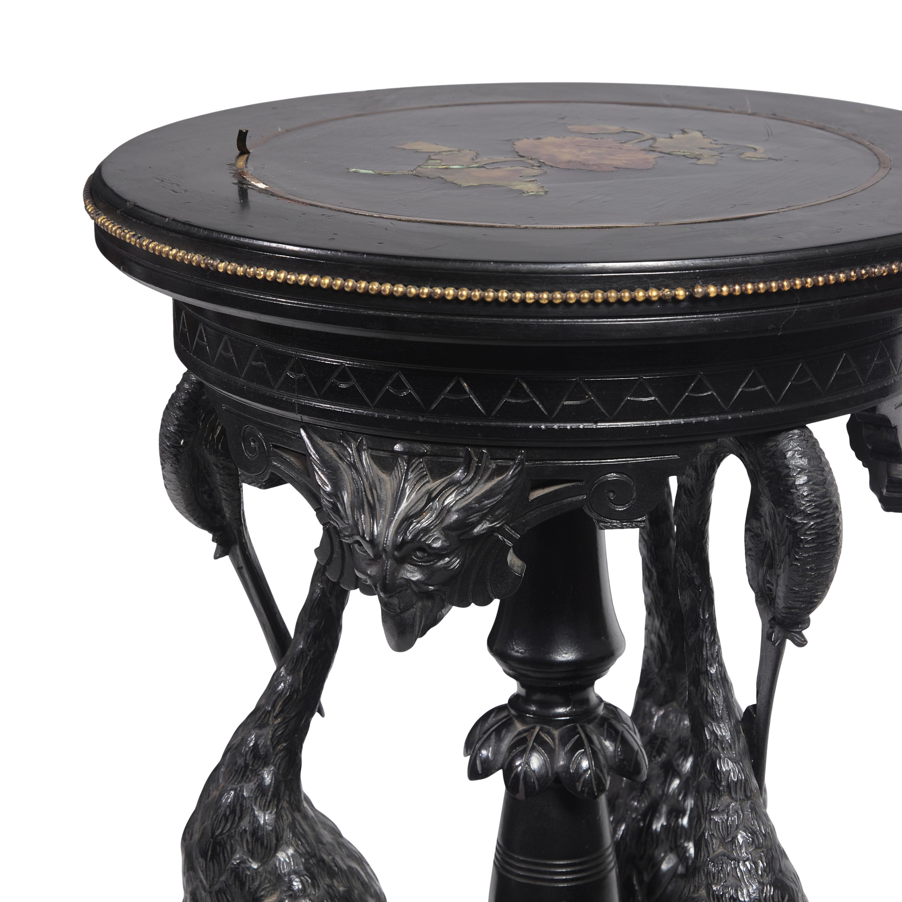 A Rare Aesthetic Movement Carved and Ebonized Wood Plant Stand