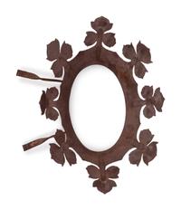 A Cast and Wrought Iron Crown-Form Wall Ornament