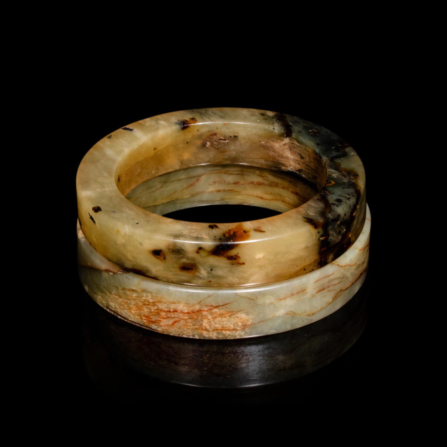 A Pair of Chinese Celadon Jade Bangles, Ming Dynasty or Later 明或更晚 青玉鐲一對