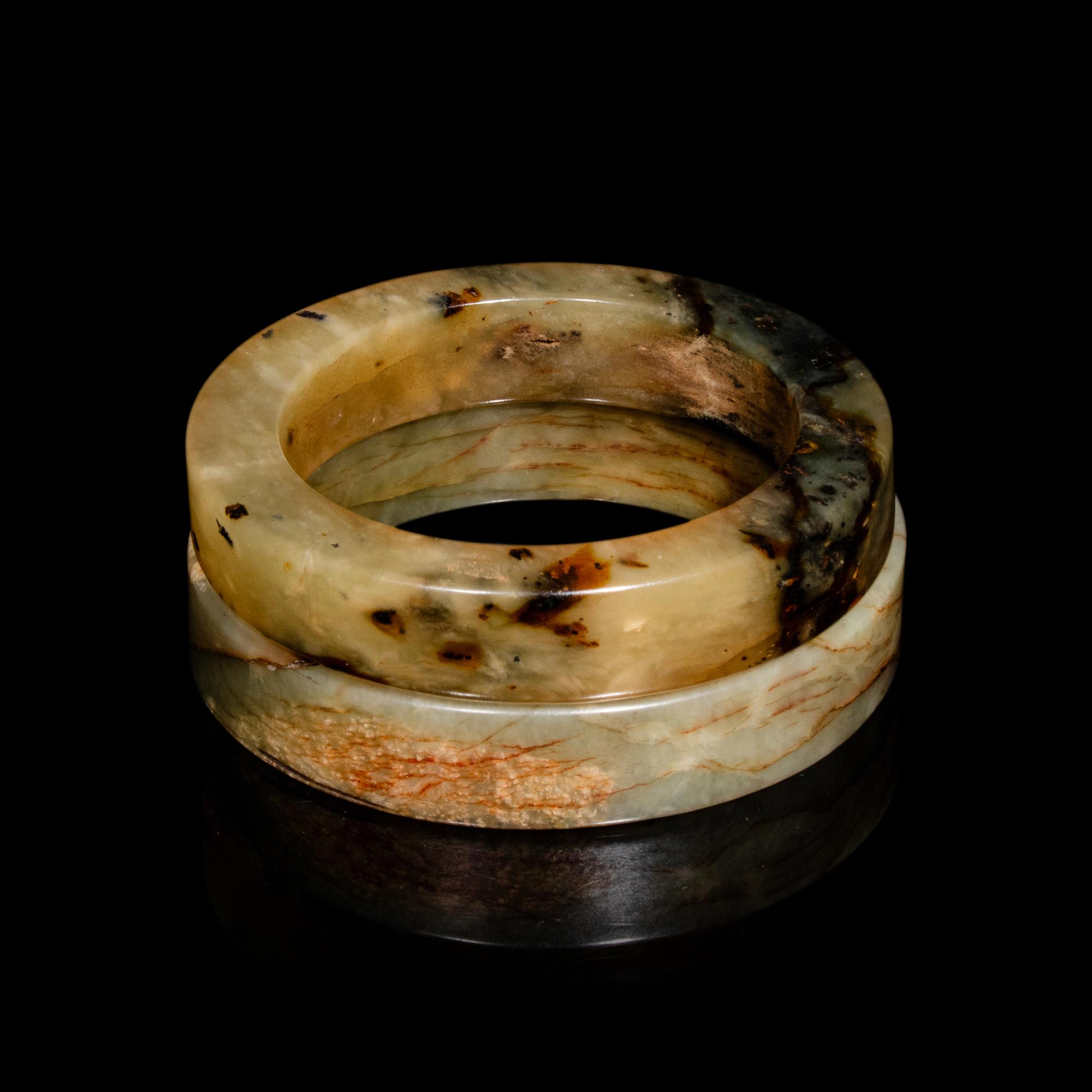 A Pair of Chinese Celadon Jade Bangles, Ming Dynasty or Later 明或更晚 青玉鐲一對