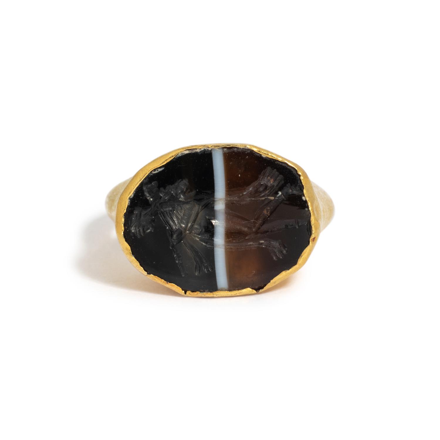 A Roman Gold and Banded Agate Finger Ring with the Goddess Diana