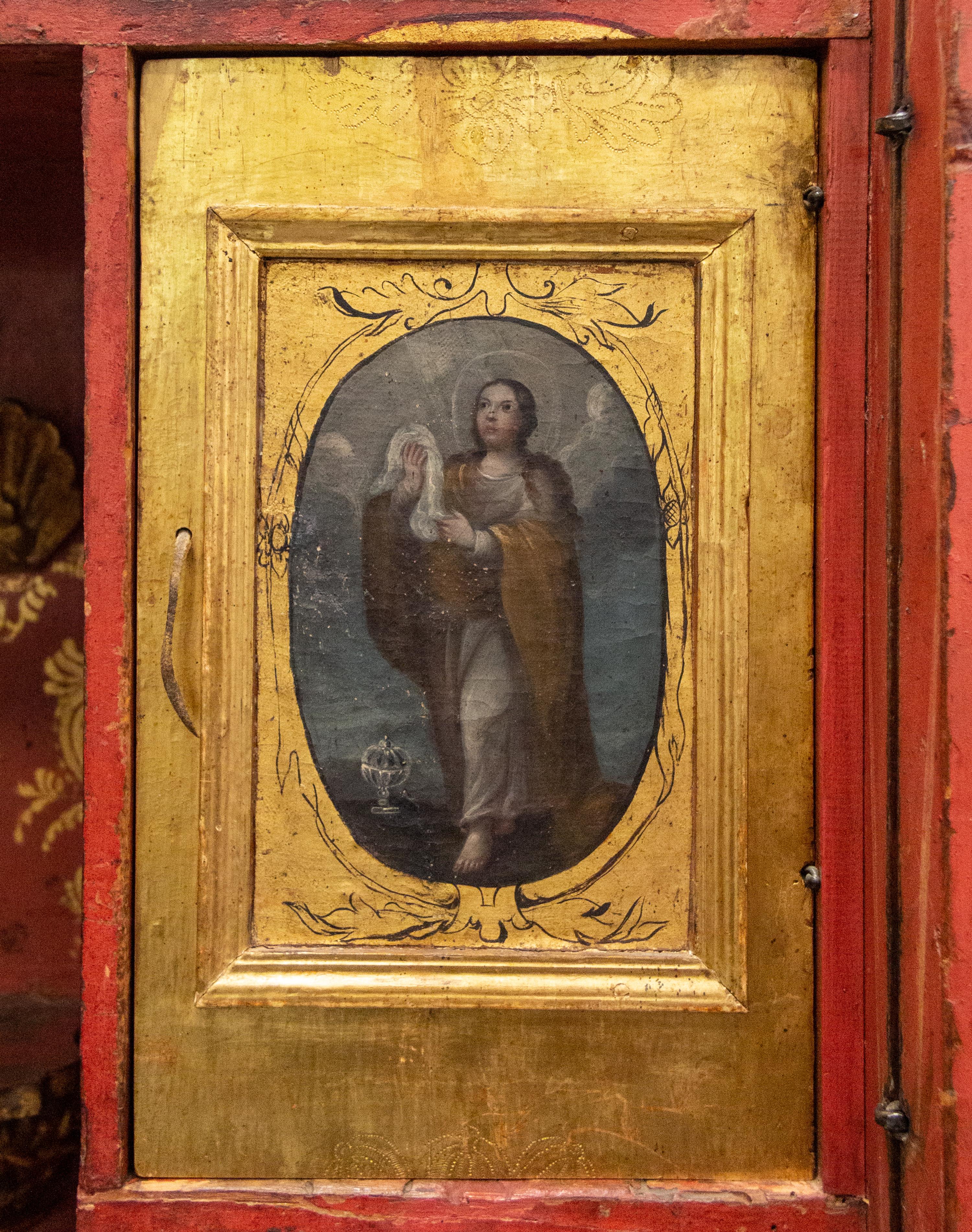 A Spanish Colonial Style Painted and Parcel Gilt Armoire