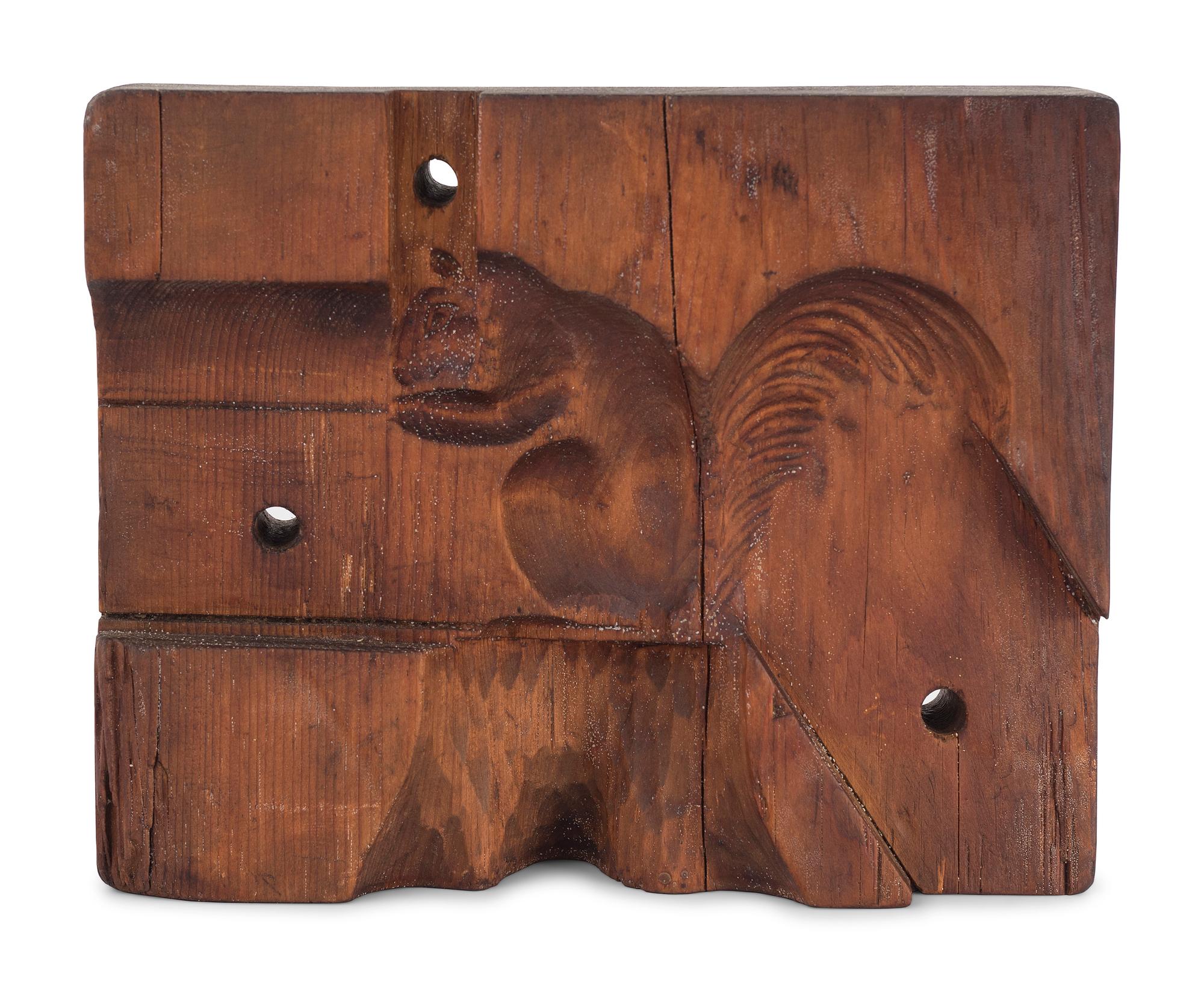 A Two-Part Carved Pine Squirrel Form Butter Mold