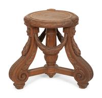 An Italian Carved Walnut Tripod Pedestal Table