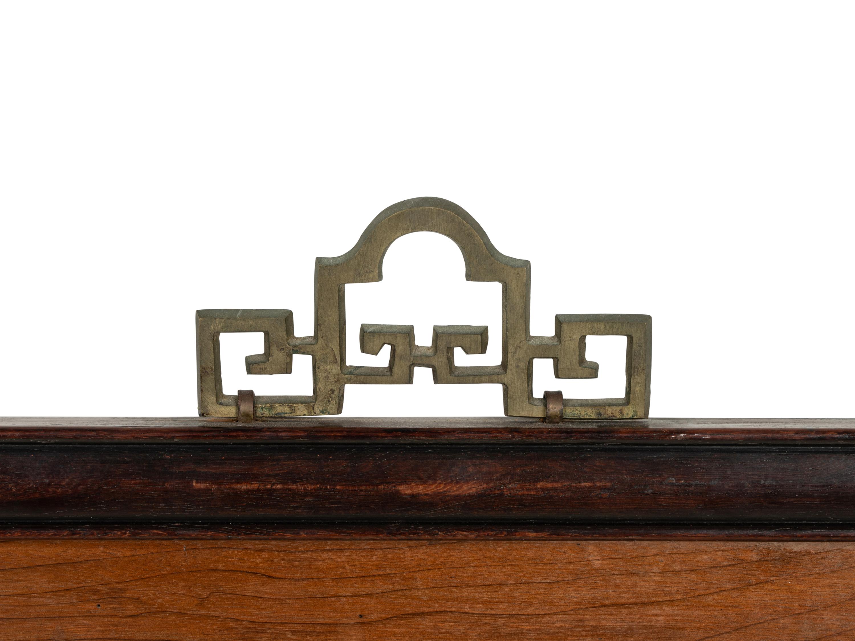 A Chinese Export Reverse-Painted Glass Mirror