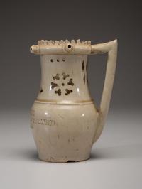 An Incised and Impressed Stoneware Puzzle Jug