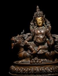 A Sino-Tibetan Gilt Bronze Figure of a Bodhisattva Vaishranava