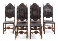A Set of Six Spanish Baroque Style Walnut Dining Chairs Height 48 1/4 inches. — 20TH CENTURY