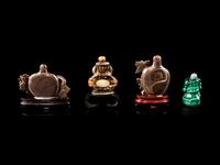 Four Chinese Hardstone Snuff Bottles