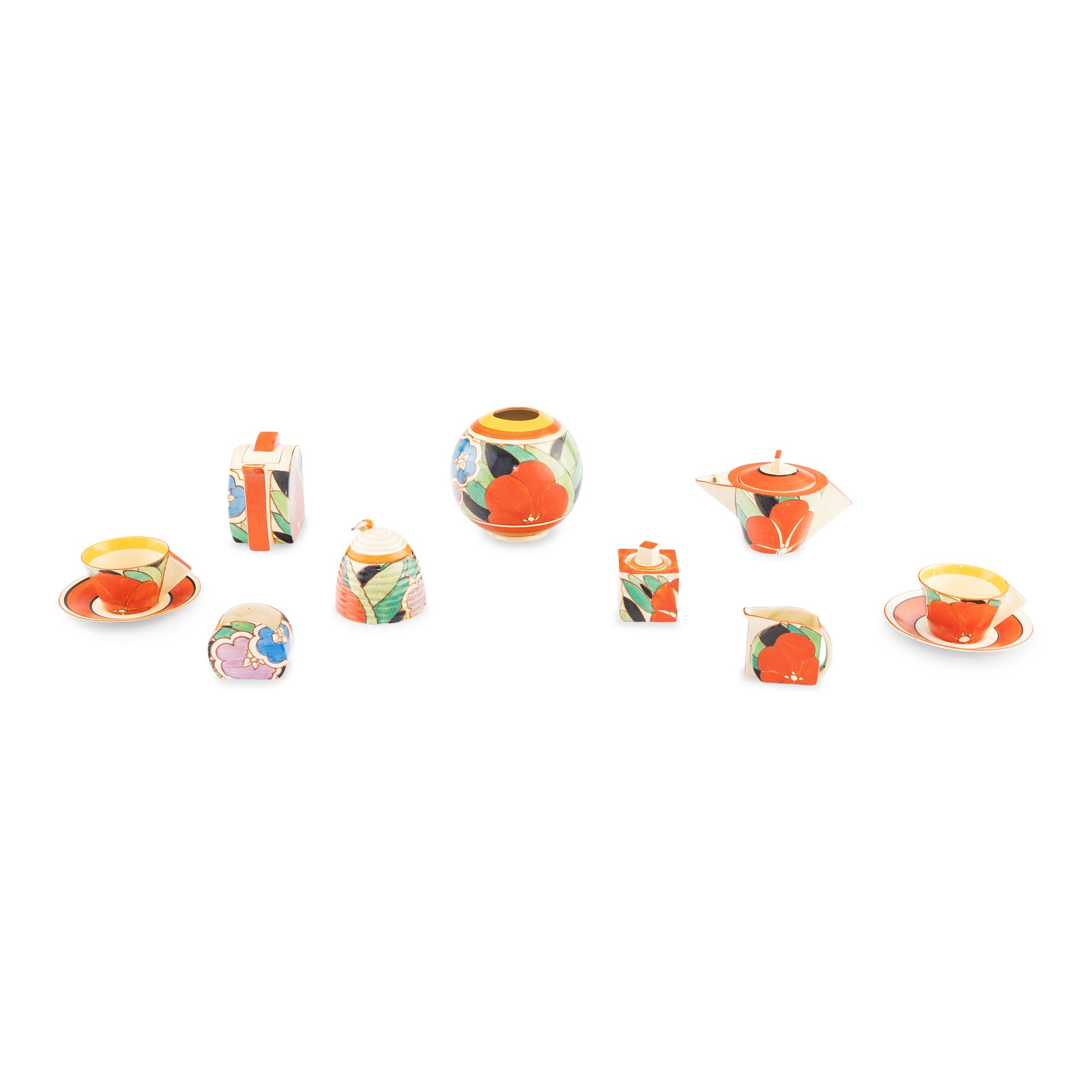 A Group of Nine Clarice Cliff Gardenia Ceramic Table Articles