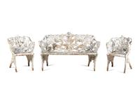 A Victorian Cast Iron Three-Piece Garden Seating Suite