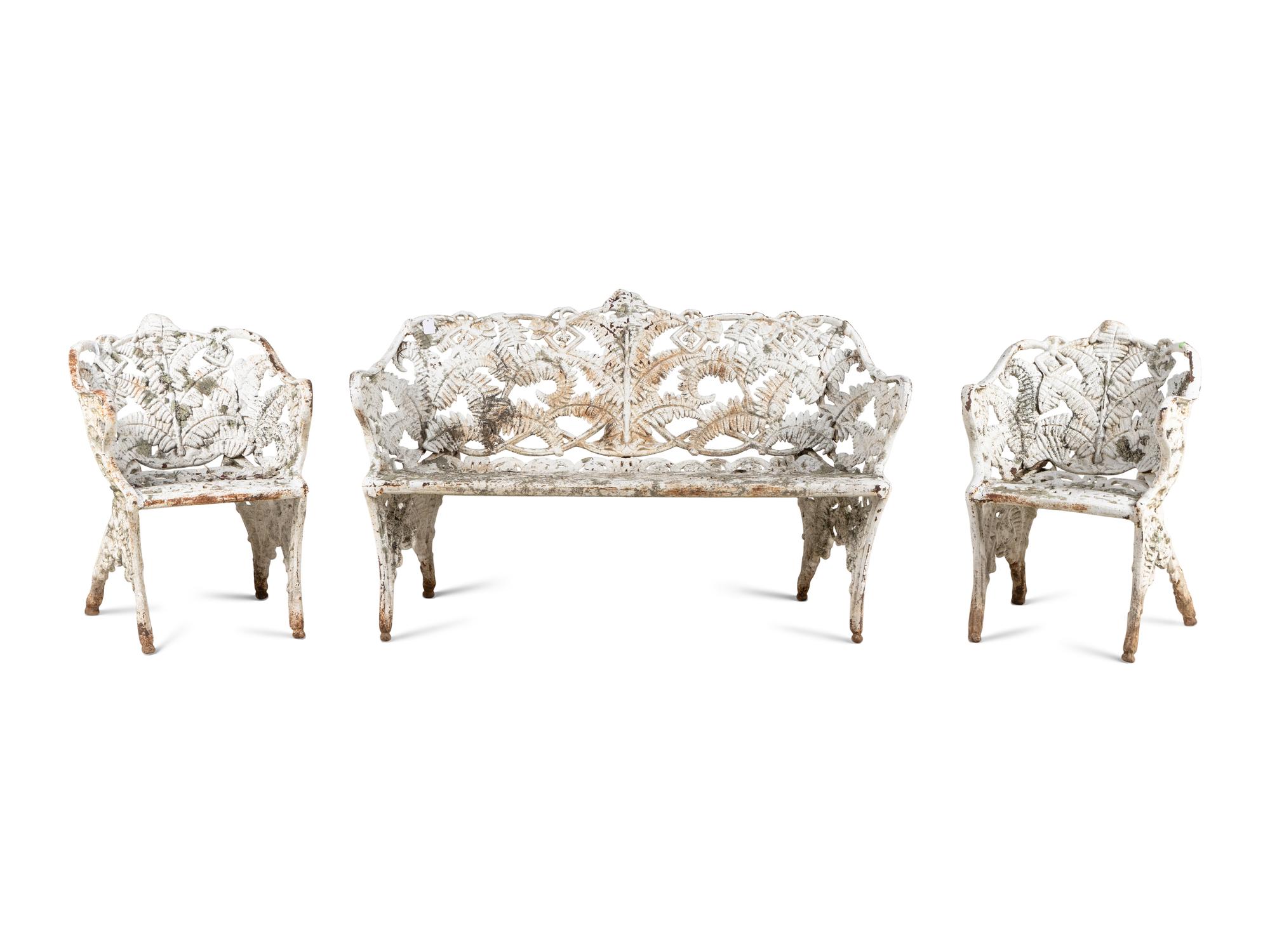 A Victorian Cast Iron Three-Piece Garden Seating Suite