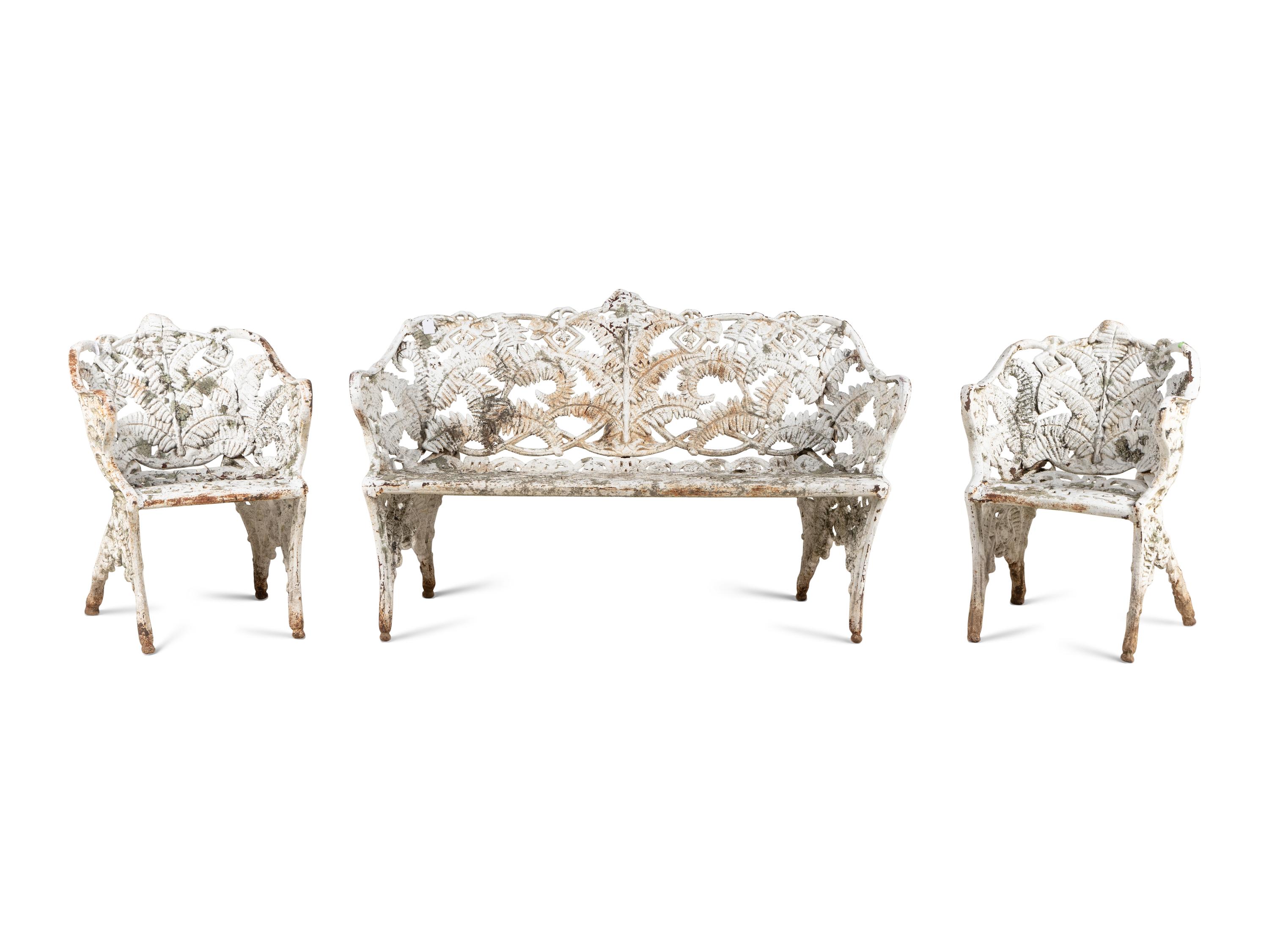 A Victorian Cast Iron Three-Piece Garden Seating Suite