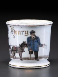 An Unusual Porcelain Occupational Shaving Mug Depicting a One-Legged Man
