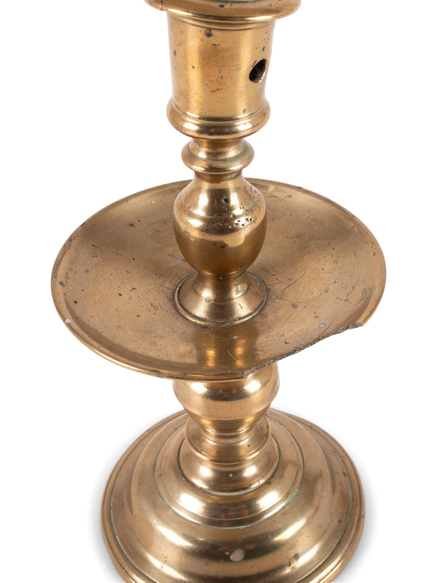 A Dutch Brass Heemskerk Candlestick