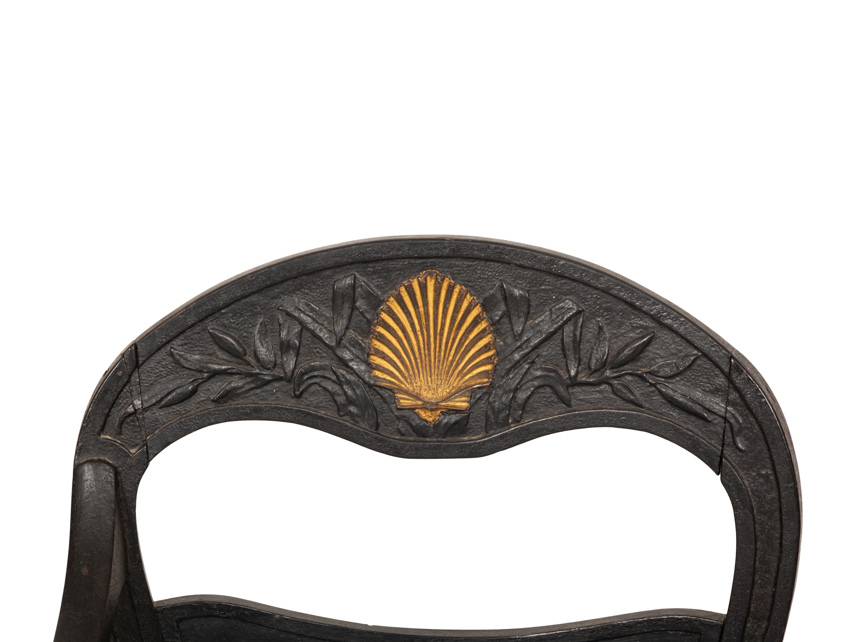 A Pair of Italian Black-Painted and Parcel Gilt Gondola Chairs