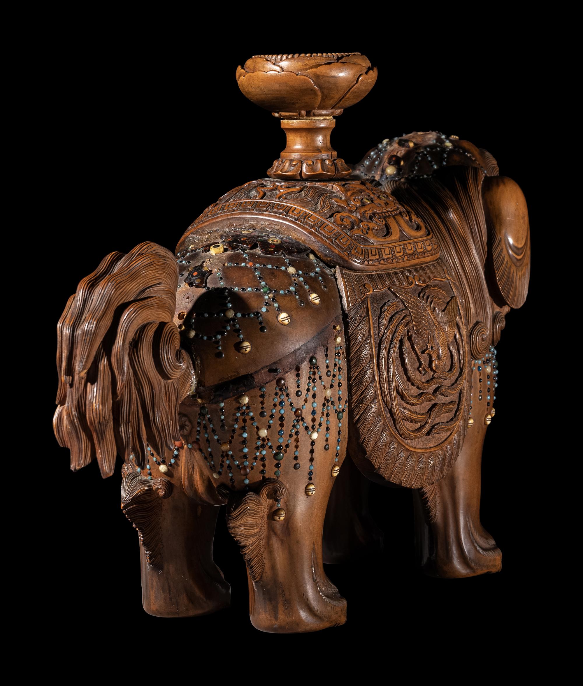 A Japanese Hardstone Inset Carved Boxwood Figure of an Shishi Lion