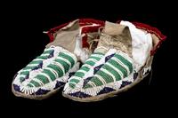A Pair of Sioux Beaded Moccasins Length 8 inches.