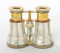 A Pair of French Mother-of-Pearl Veneered Opera Glasses, Width 4 7/8 inches.