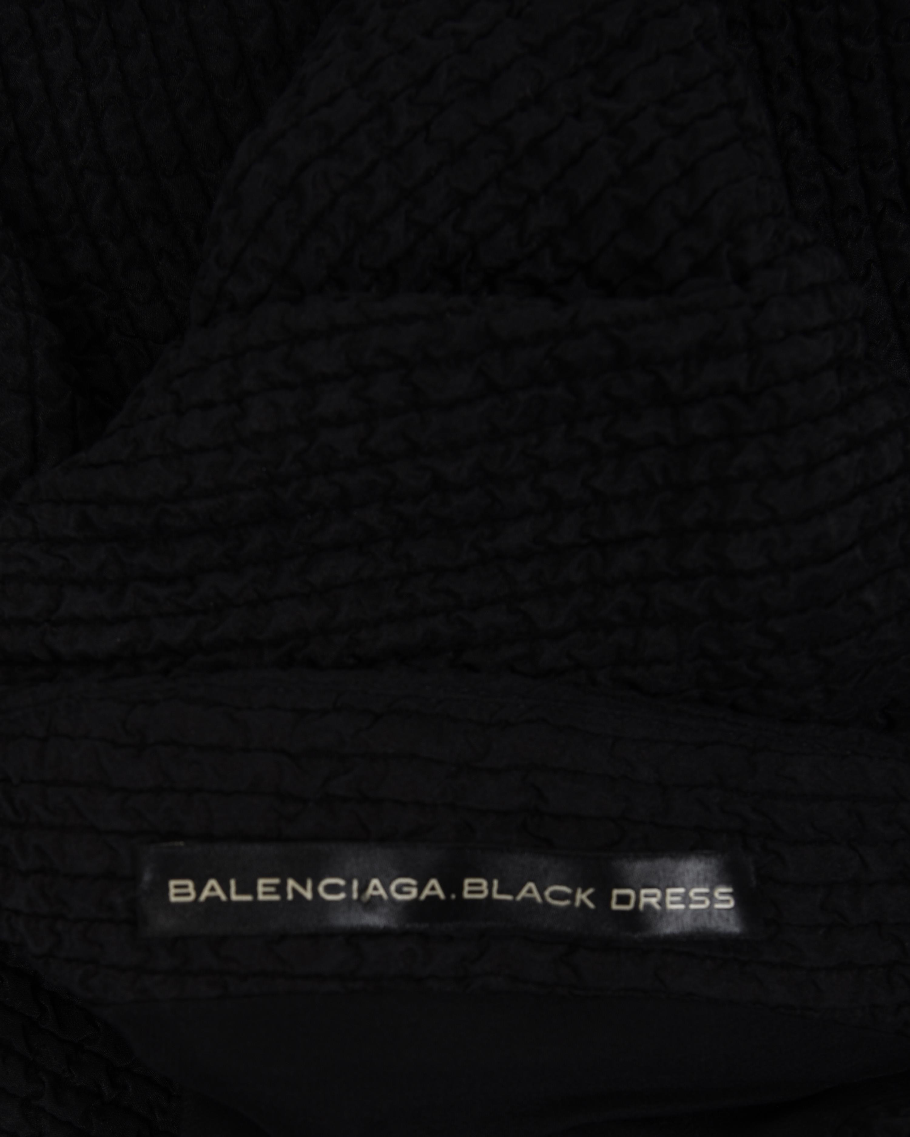 Four Designer Dresses: Two Oscar de la Renta, One Balenciaga, and One Christian Dior, 2000s