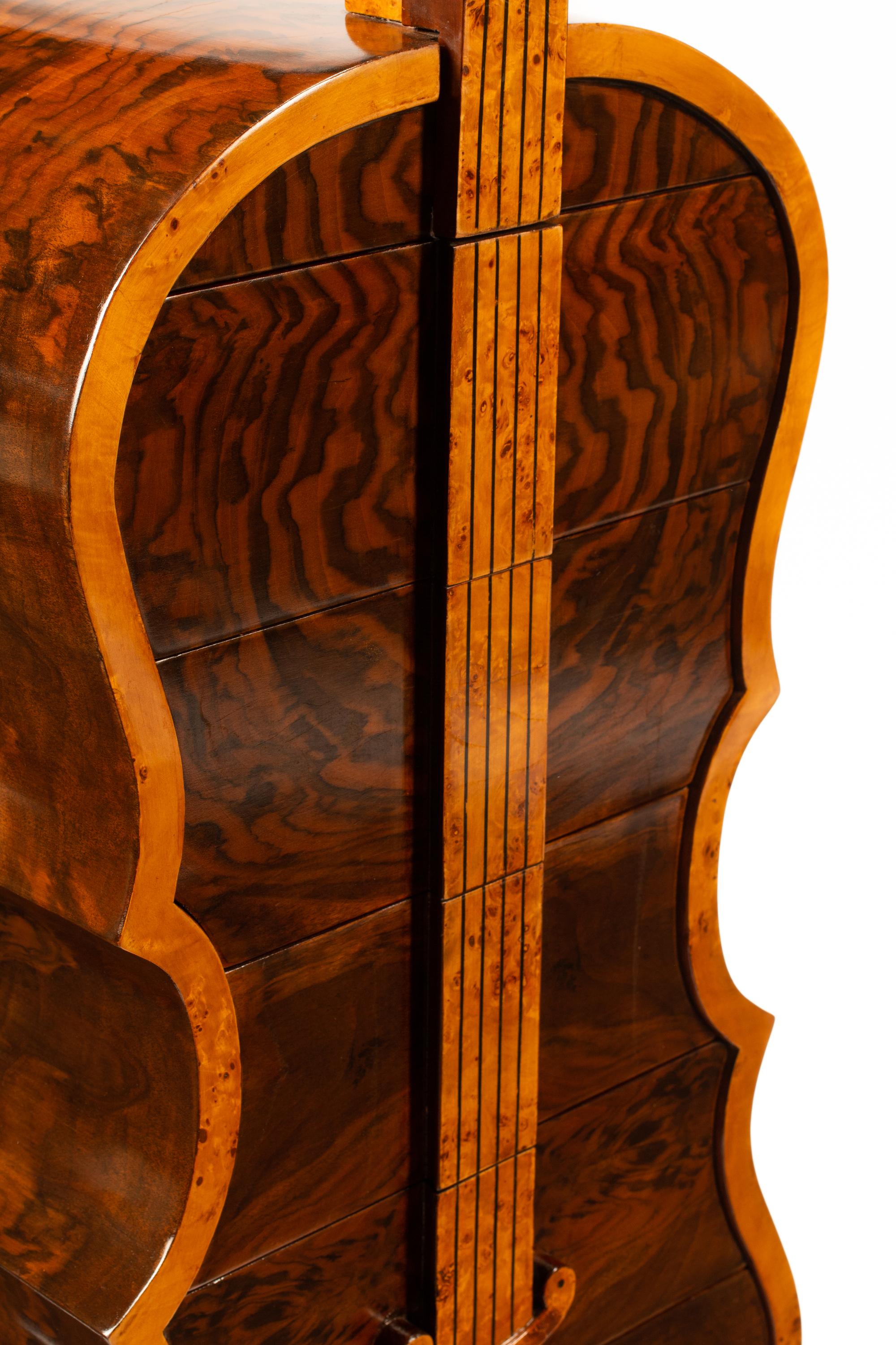 A Burlwood Veneered Cello-Form Cabinet