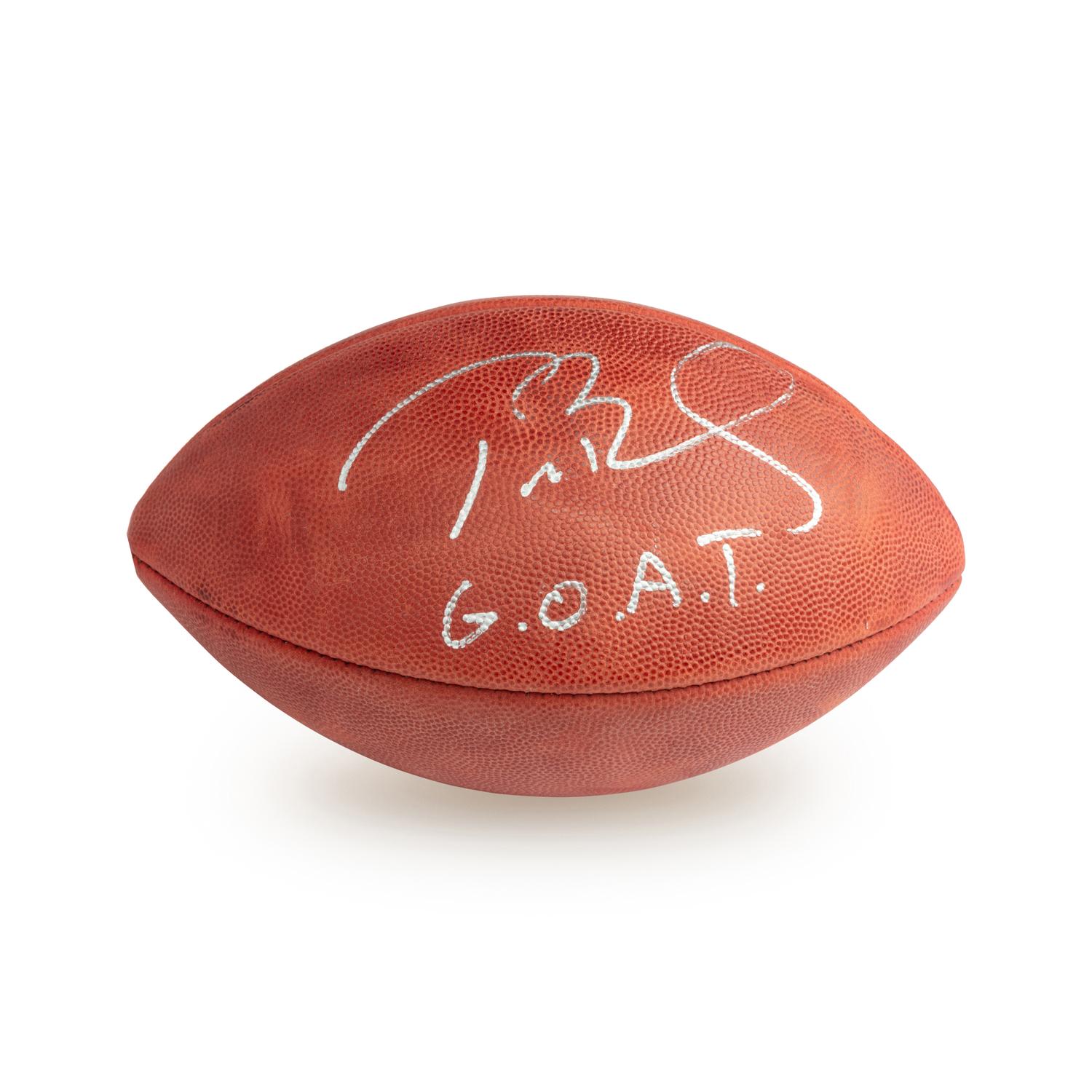 A Tom Brady Signed Autograph Football with Extraordinarily Rare G.O.A.T. Inscription (G.O.A.T Authentics Letter)